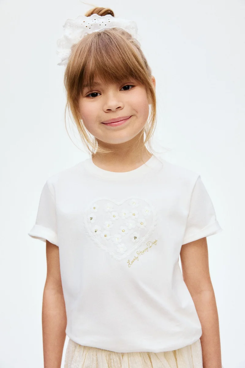 اتش اند ام تي-شيرت بتفاصيل مزخرفة