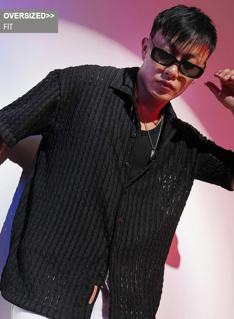 Campus Sutra Men's Onyx Black Striped Knit Oversized Shirt For Casual Wear | Cuban Collar | Short Sleeve | Button Closure | Oversized Shirt Crafted With Comfort Fit For Everyday Wear