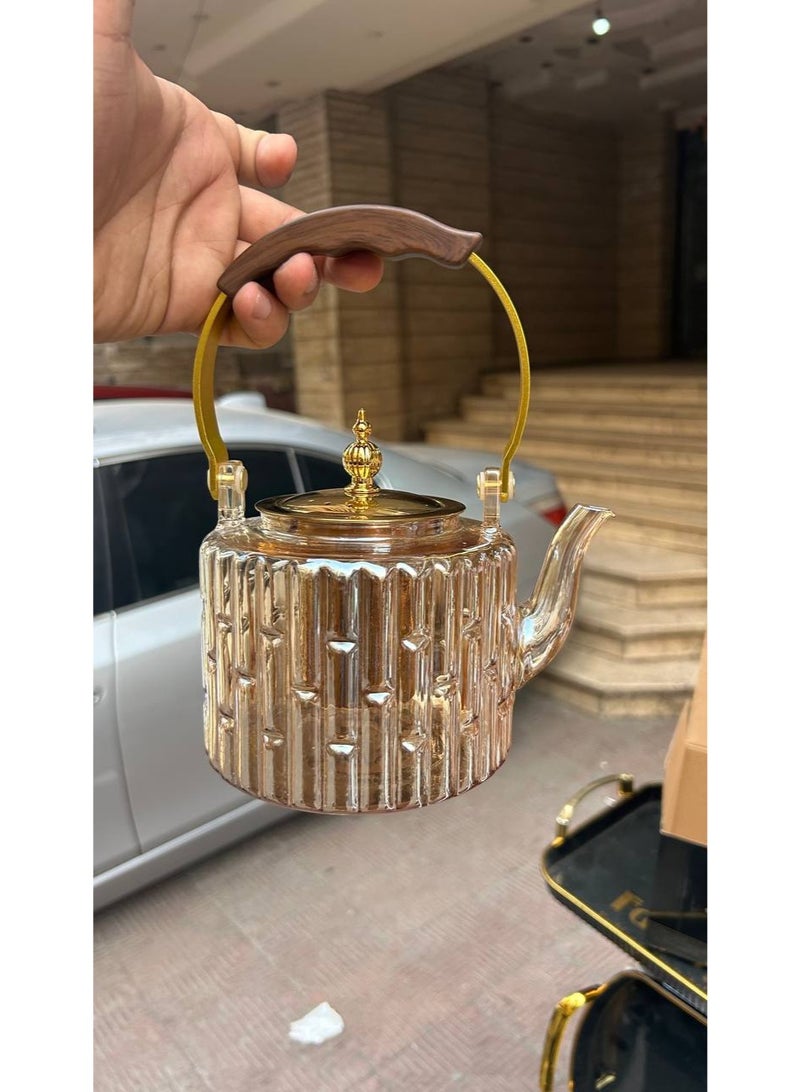 Thermal glass kettle with a thermal wooden handle, a golden lid, thermal glass that can withstand high temperatures, direct fire, and an internal filter so you can make the best herbs  - Image 3