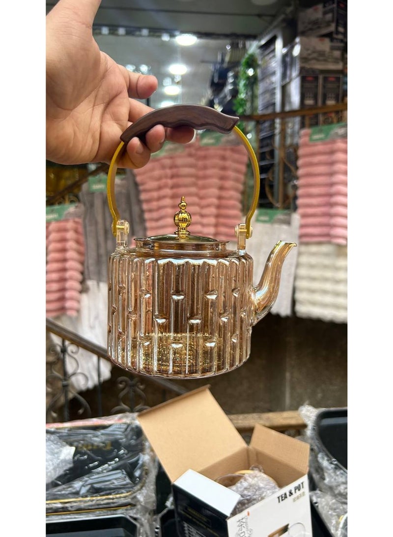 Thermal glass kettle with a thermal wooden handle, a golden lid, thermal glass that can withstand high temperatures, direct fire, and an internal filter so you can make the best herbs  - Image 2