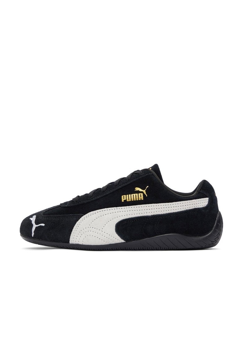 pumagolf سنيكرز سبيد كات جو أو جي من بوما أسود/أبيض للرجال/النساء/الطلاب - Image 1