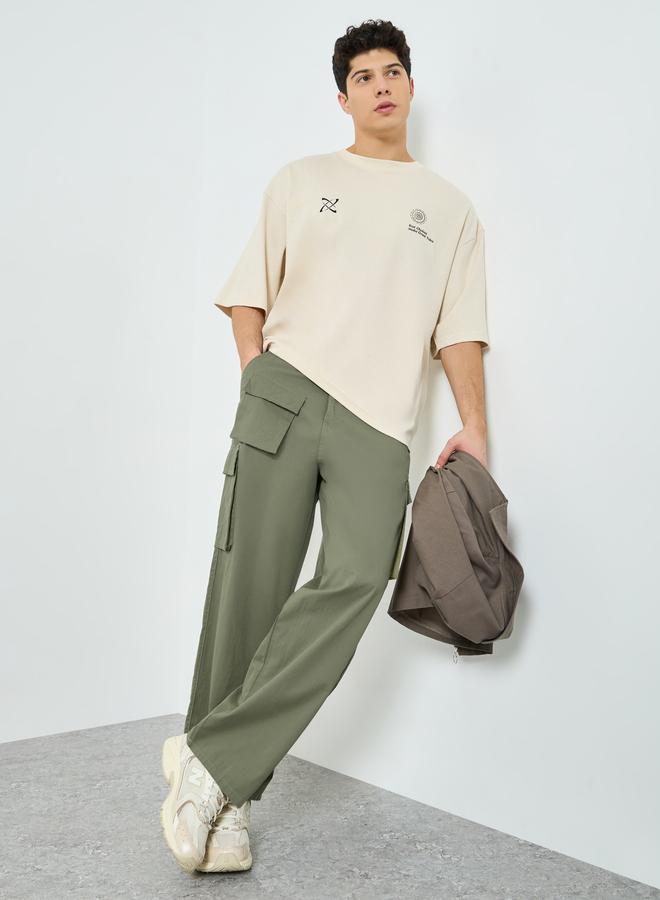 Styli Men Olive Green Baggy Fit Trousers - Image 1