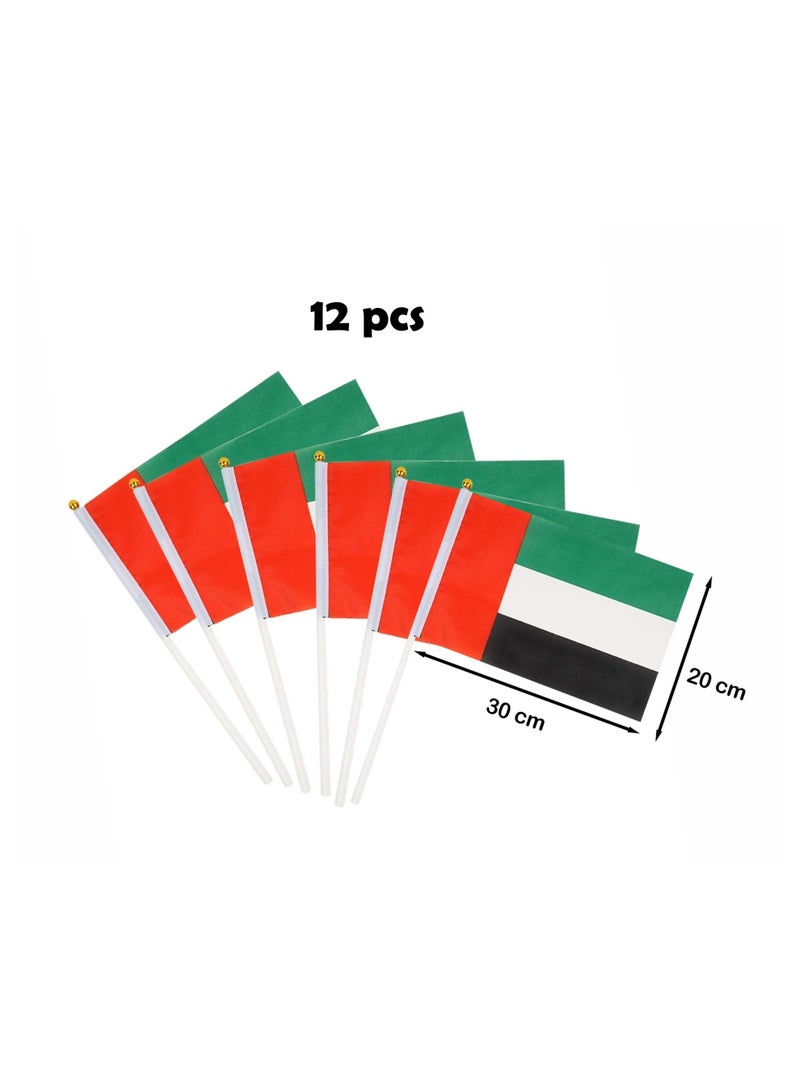 Souvenir Souq Set of 12 UAE  flags (30x20 cm) made from premium shiny satin fabric with vibrant colors. Each flag comes with a durable plastic stick for easy holding—perfect for National Day celebrations, events, and decorations for indoor and outdoor use in homes, offices, buildings,Apartments and villas. - Image 1