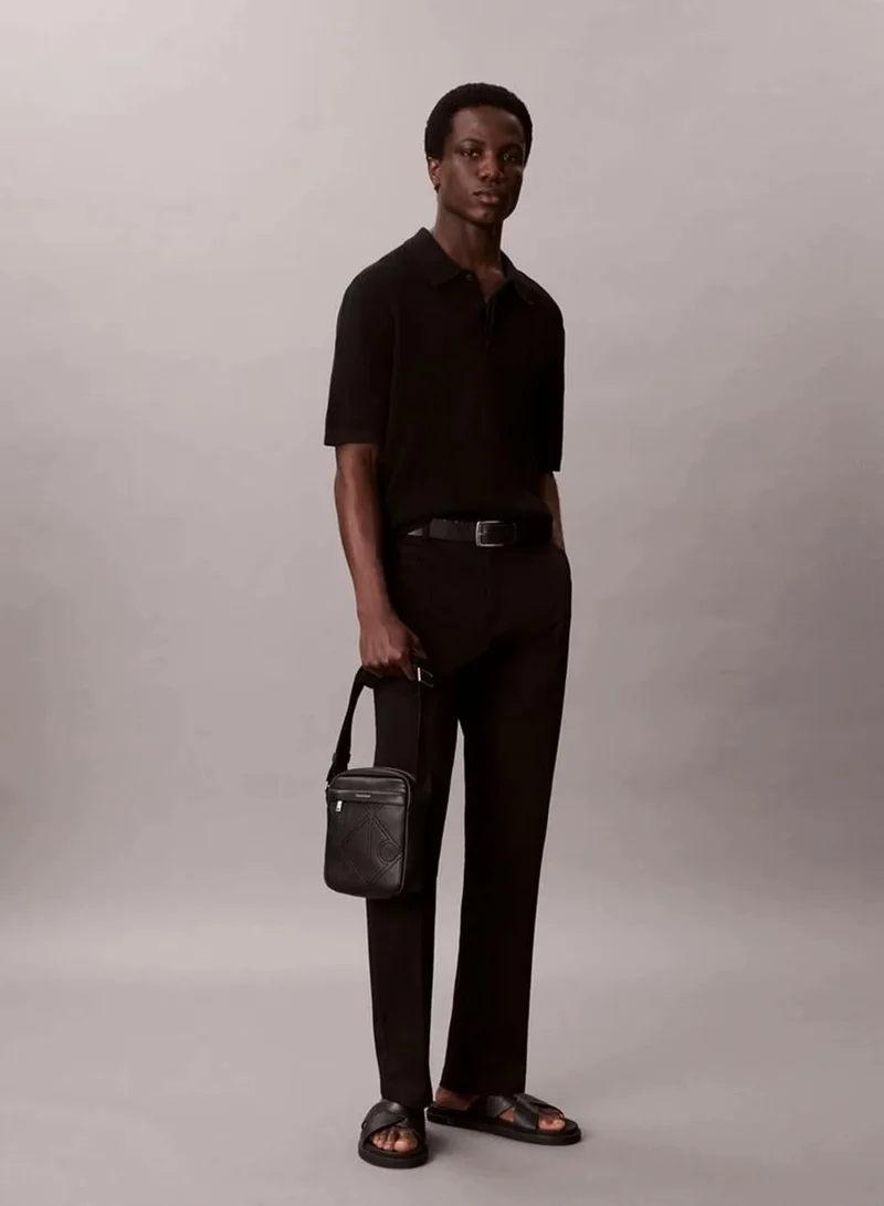 Calvin Klein Black Allover Embossed Emblem Logo Reporter Bag for Men | Best Price UAE