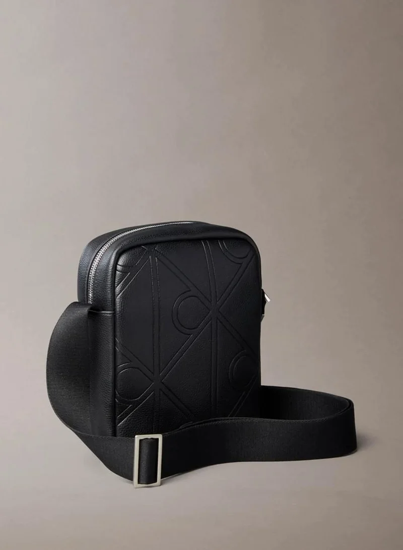Calvin Klein Black Allover Embossed Emblem Logo Reporter Bag for Men | Best Price UAE