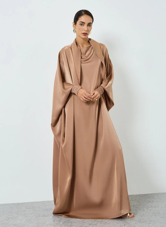 تايك تو جلابية بيج بأكمام خفاش للنساء