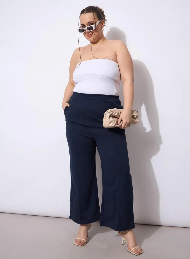 ساسافراس بنطال بأرجل واسعة ومقاس كبير