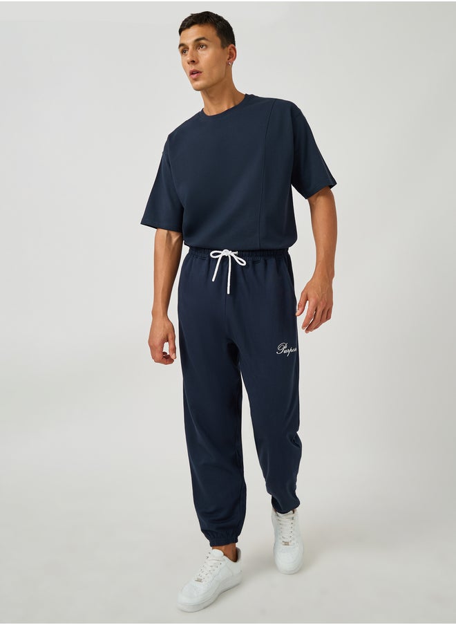 Styli Styli Minimal Slogan Print Oversized Joggers with Drawstring  - Image 2
