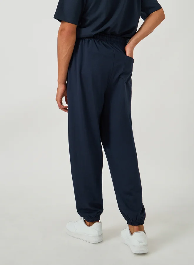 Styli Styli Minimal Slogan Print Oversized Joggers with Drawstring