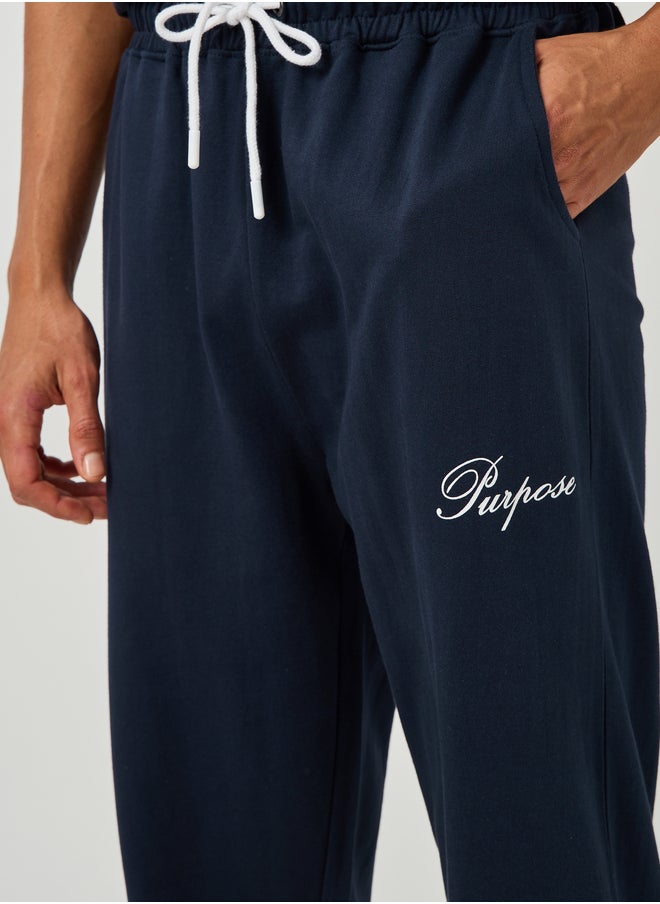 Styli Styli Minimal Slogan Print Oversized Joggers with Drawstring  - Image 3