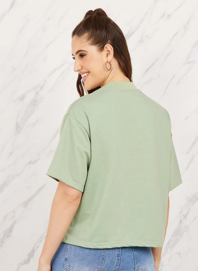 ستايلي Ribbed High Neck Dropped Shoulder Boxy Fit T-Shirt