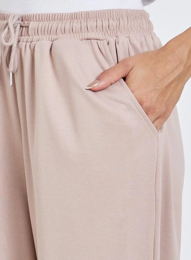 Styli Styli Solid Wide Leg Joggers with Drawstring Waistband