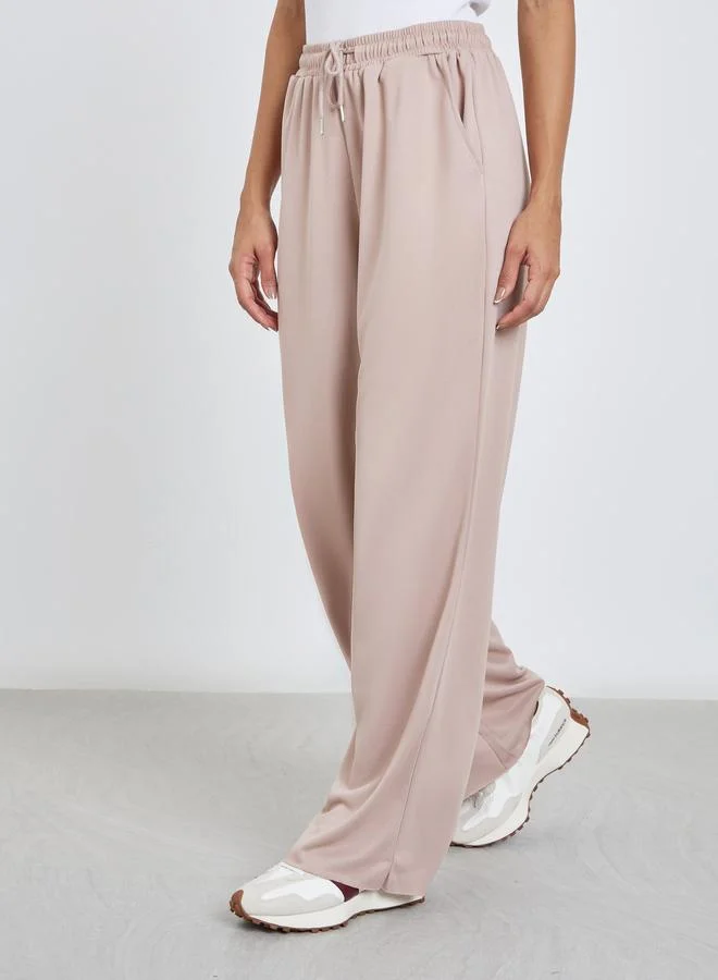 Styli Styli Solid Wide Leg Joggers with Drawstring Waistband