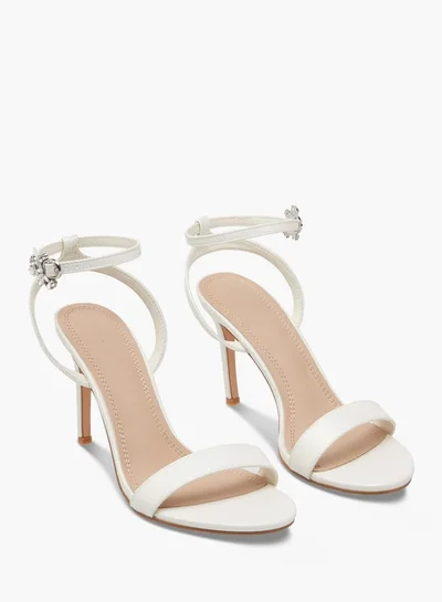 فلورا بيلا من شو إكسبرس Women Embellished Sandals with Stiletto Heels and Buckle Closure