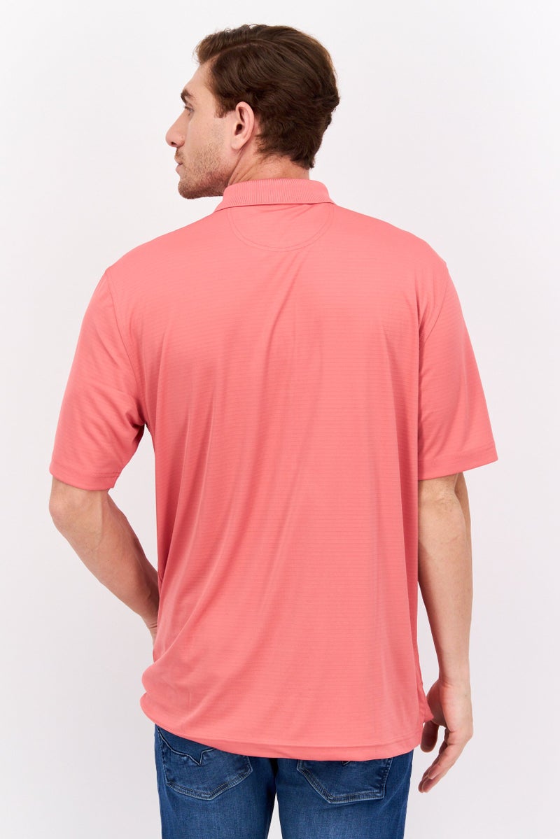 Greg Norman تي شيرت بولو للرجال بقصة عادية بأكمام قصيرة، كورال - Image 3