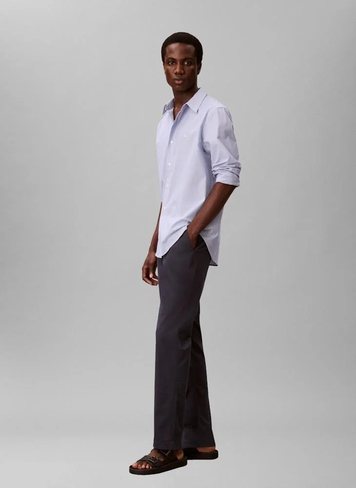 Calvin Klein Jeans  Slim Fit Buttoned Chinos for Men | Best Price UAE