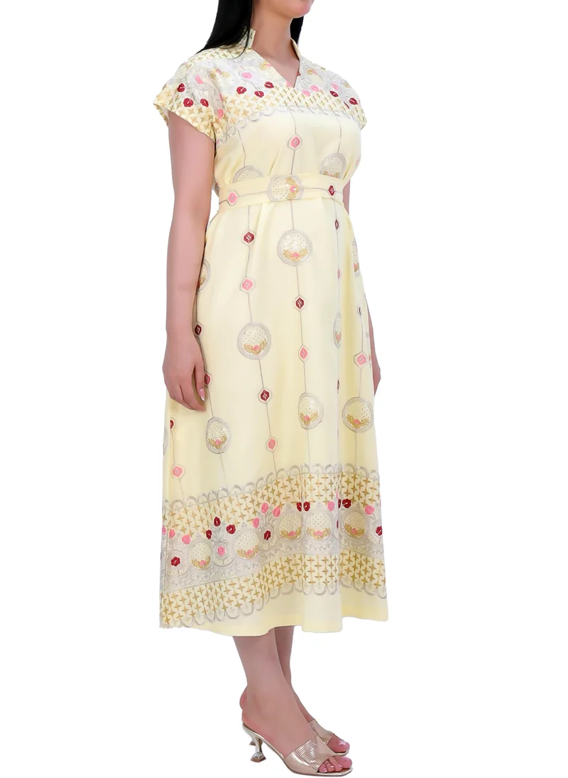 ان لاف Elegant dress made of lightweight fabric in multiple colors with golden and red embroidery.