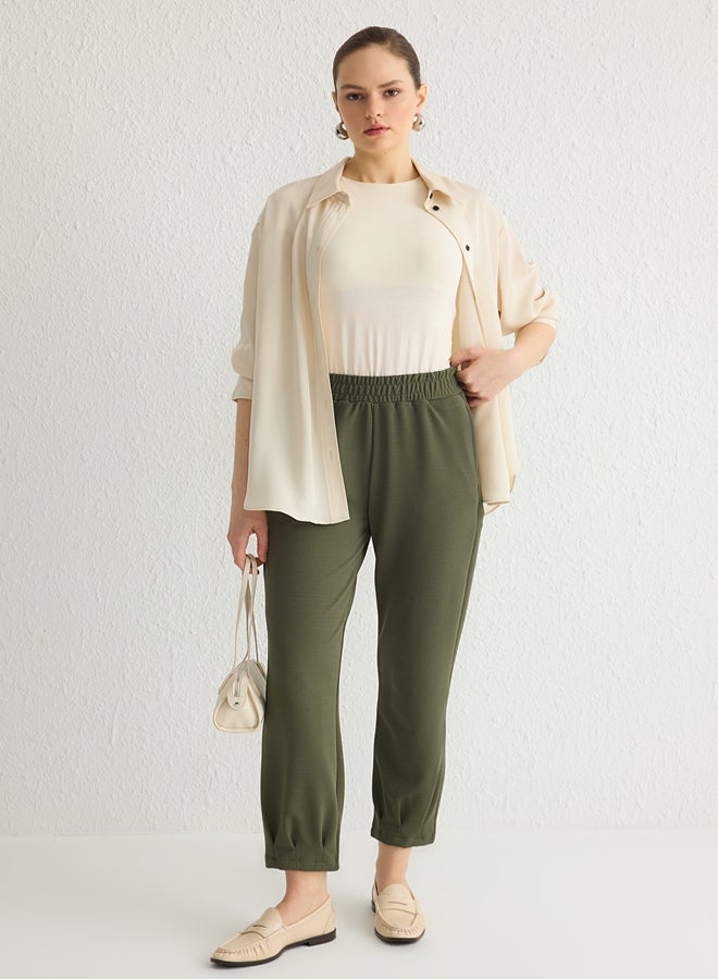 trendyol Khaki Plain Crepe Knitted Trousers TCTSS25TP00002 - Image 1