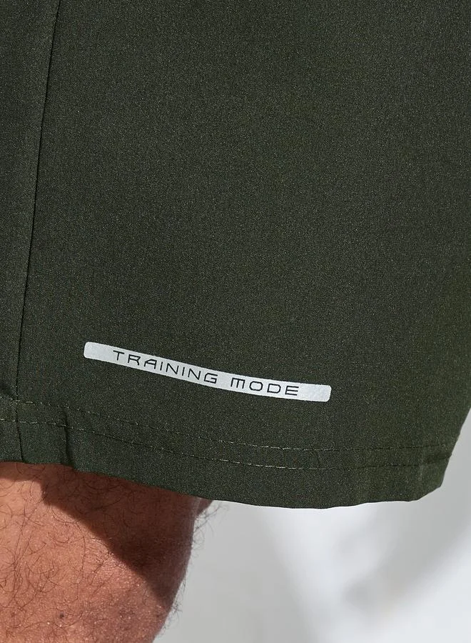 Styli  Olive Solid Drawstring Running Shorts with Side Pockets for Men | Best Price UAE