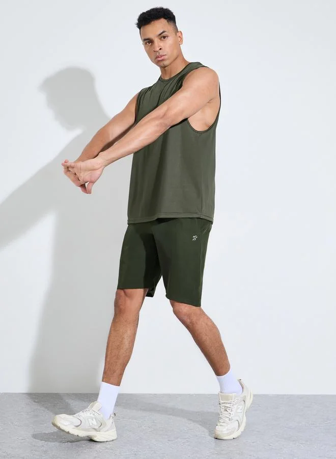 Styli  Olive Solid Drawstring Running Shorts with Side Pockets for Men | Best Price UAE
