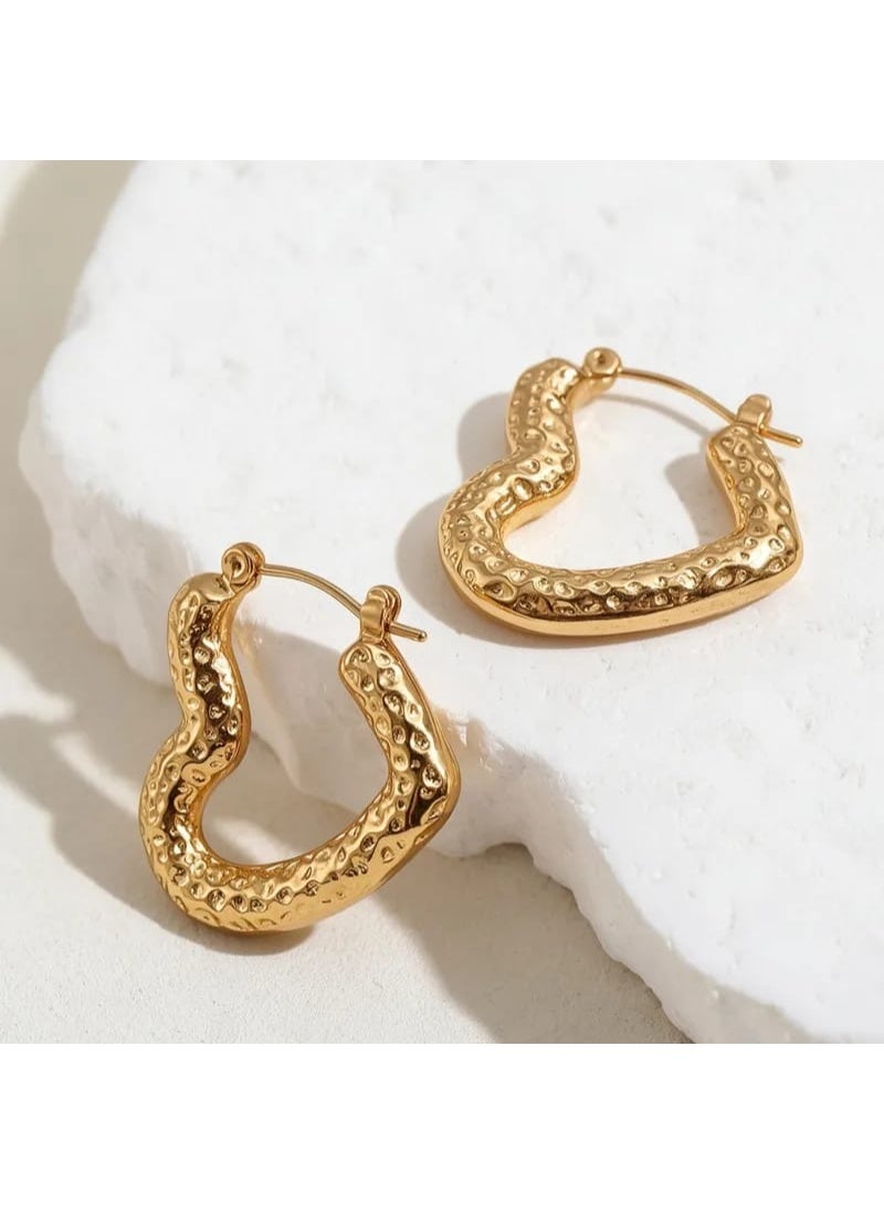 Luxuria Women's gold heart-shaped earrings with a hammered design and textured finish, similar to models made of gold-plated stainless steel jewelry for women. - Image 1