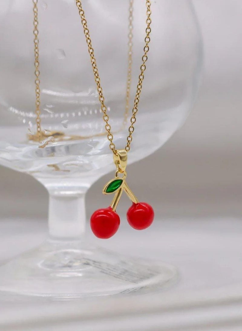 An elegant fruity cherry shaped medallion with a sophisticated and distinctive design, ideal for everyday decoration and a modern touch for travel and outdoor accessories