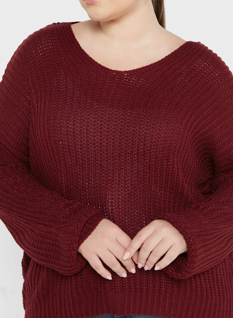ايلا بلس كنزة بياقة مثلثة و أكمام واسعة