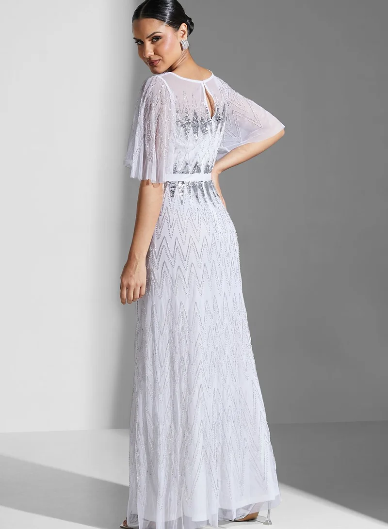 Amelia Rose Tiered Cape Sleeve Sequin Dress