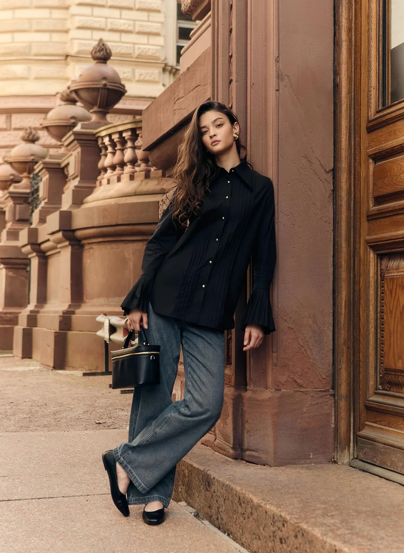 ليتشي قميص بأصفاد مطوية وأزرار معدنية