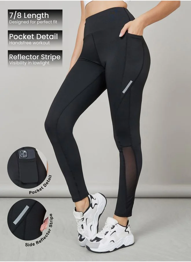 Styli Reflector Striped Pocket Detail Calf Mesh 7/8 Active Leggings