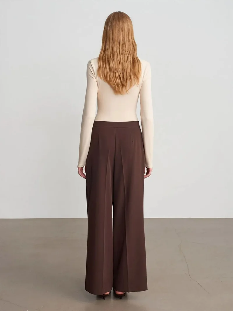 ديلفين Dilvin Wide-leg Belted Crepe Trousers