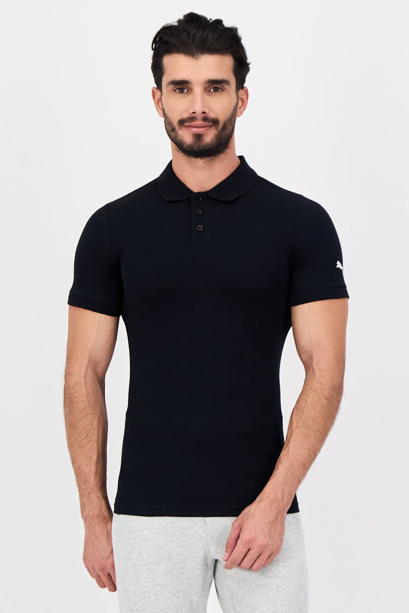 PUMA Men Sportswear Fit Short Sleeve Outdoor Polo Shirt, Black - Image 1
