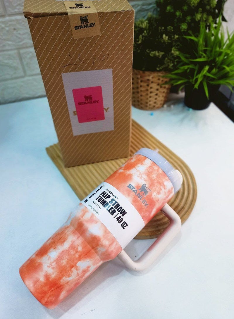 ستانلي كوب كوينشر H2.0 فلو ستيت معزول بتفريغ الهواء من ستانلي من الستانلس ستيل مع غطاء وماصة للمياه والشاي المثلج او القهوة والسموذي واكثر من ذلك، لون اورنج رخامي 2.0، 40 اونصة - Image 1