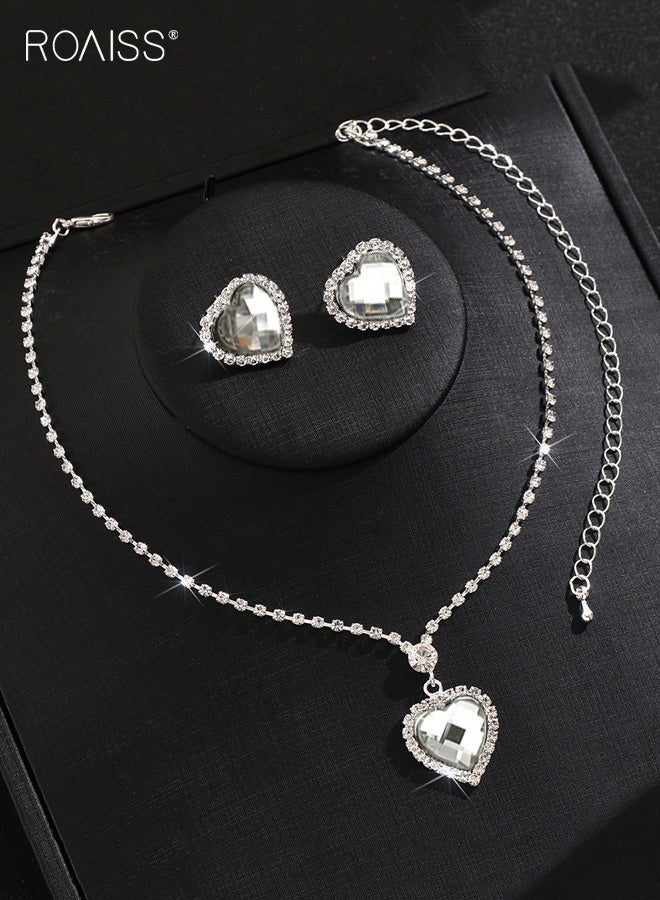 رويس طقم مجوهرات فضي على شكل قلب، طقم أقراط وقلادة مرصعة بأحجار الراين، طقم مجوهرات لحفلات الزفاف الرسمية للنساء والعرائس - Image 3