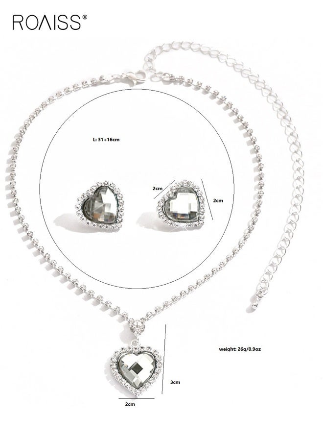 رويس طقم مجوهرات فضي على شكل قلب، طقم أقراط وقلادة مرصعة بأحجار الراين، طقم مجوهرات لحفلات الزفاف الرسمية للنساء والعرائس - Image 2