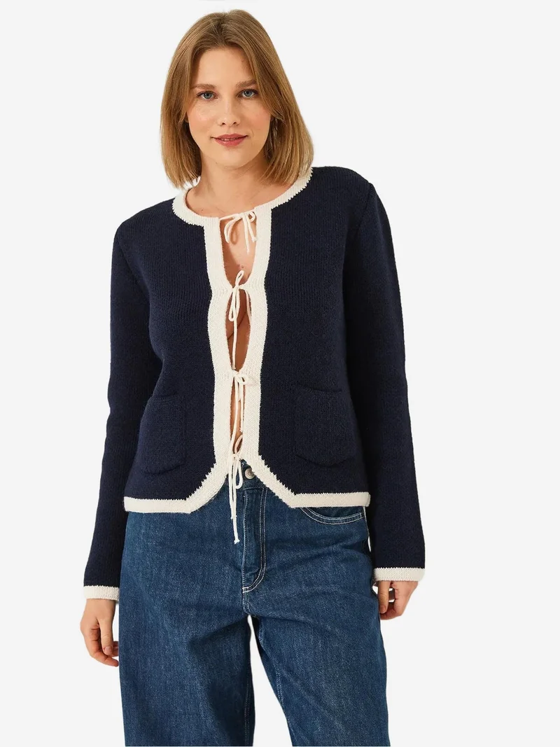 بيانكو لوتشي كارديجان محبوك مضلع من لوتشي مع ربطة بوم بوم