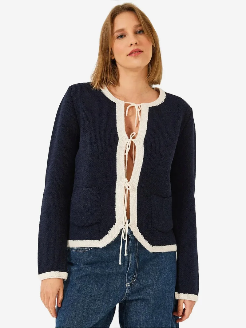 بيانكو لوتشي كارديجان محبوك مضلع من لوتشي مع ربطة بوم بوم