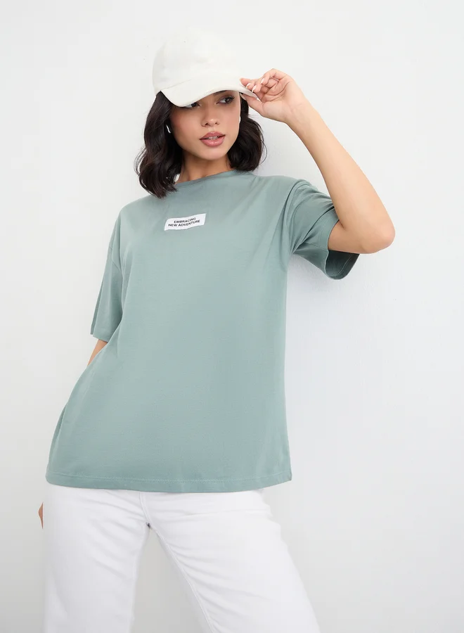 Styli Styli Green Oversized T-Shirt with Patch Detail