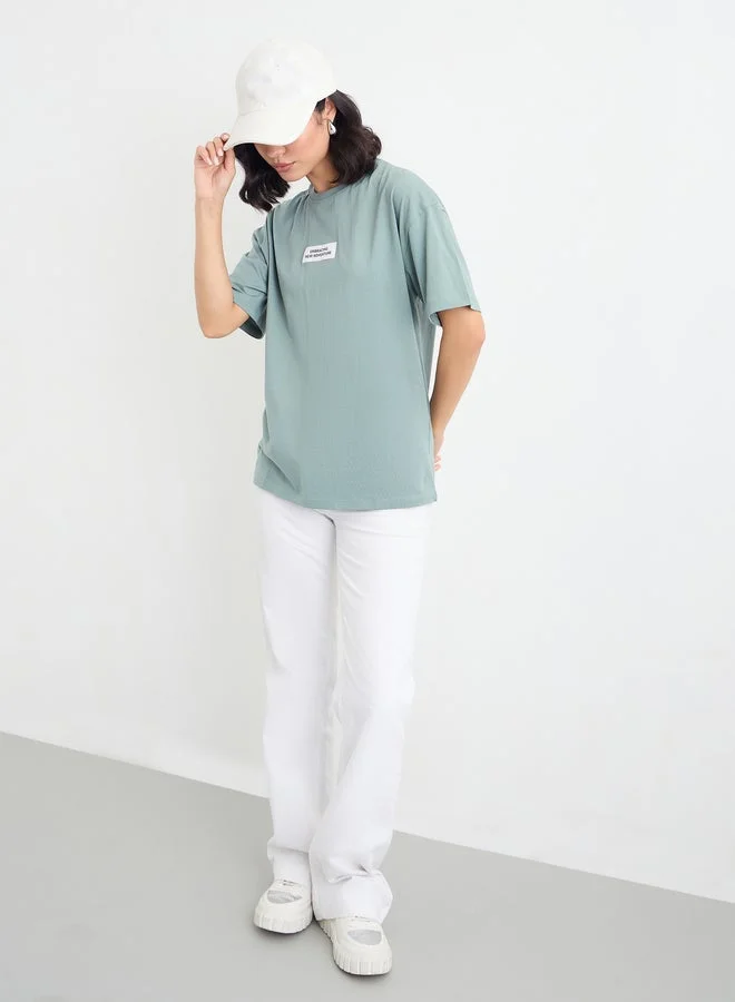 Styli Styli Green Oversized T-Shirt with Patch Detail