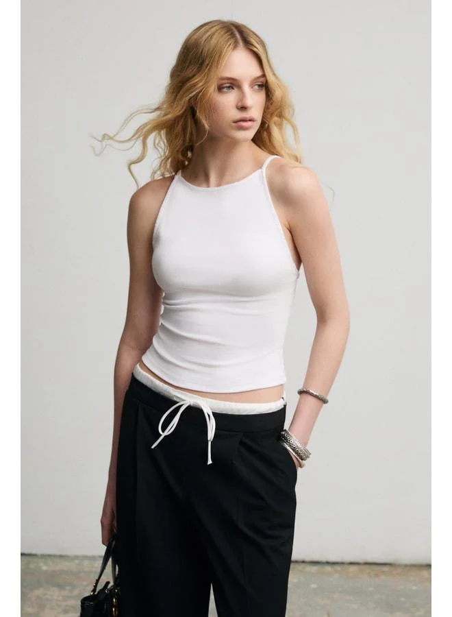 Grimelange CELISSE Women's Soft and Stretchy Fabric Organic Cotton Backless Strappy White Blouse.