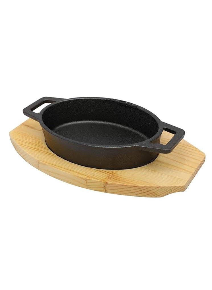مقلاة من الحديد الزهر بيضاوية الشكل مقاس 17سم*12سم مع مقابض جانبية و قاعدة خشبية | صينية للتحمير و الطبخ و الشواء من الحديد المصبوب أمنة للاستخدام في الفرن - Image 2