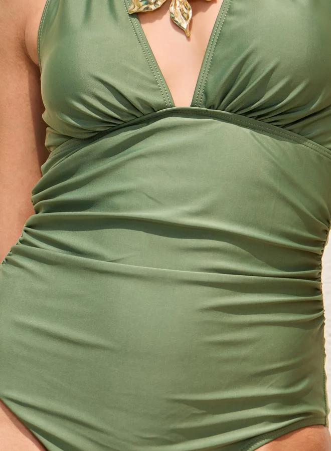 Styli  Green Halter Plunge Neck Swimsuit with Ruched Front for Women | Best Price UAE