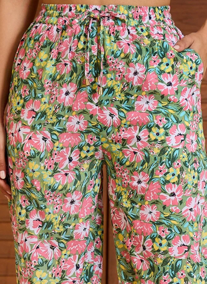 SASSAFRAS Floral Printed V Neck Peplum Top With Trousers For Women