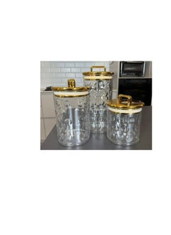 The most beautiful Mother's Day gifts, a very chic 3-in-1 set of acrylic jars with a rectangular gold handle and a gold letter on the base. It will impress your guests and is a masterpiece in the coffee corner. It can be used for storing tea, sugar, and coffee, as well as candy and nuts, and for storing legumes and pasta. It consists of 3 jars of different sizes. With a very tight gold-plated lid, it is a very valuable gift. A high-quality imported product.