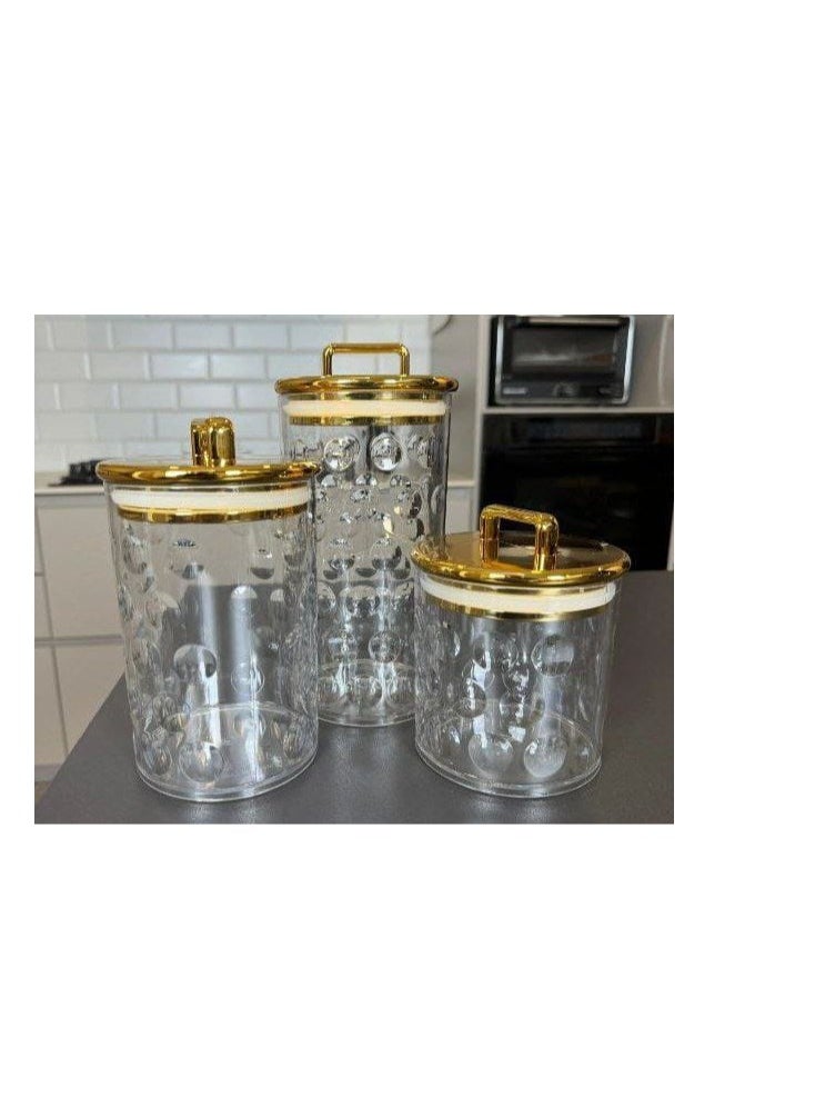 Generic - The most beautiful Mother's Day gifts, a very chic 3-in-1 set of acrylic jars with a rectangular gold handle and a gold letter on the base. It will impress your guests and is a masterpiece in the coffee corner. It can be used for storing tea, sugar, and coffee, as well as candy and nuts, and for storing legumes and pasta. It consists of 3 jars of different sizes. With a very tight gold-plated lid, it is a very valuable gift. A high-quality imported product. - Image 1
