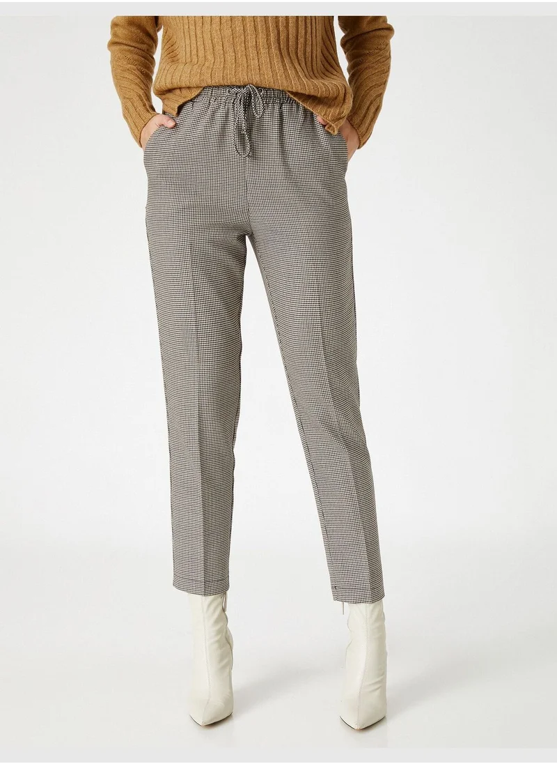 KOTON Drawstring Pocket Carrot Trousers