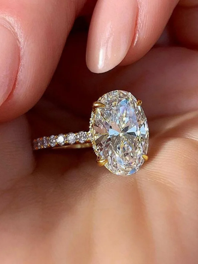 Embellished Ring with Oval Cut Stone