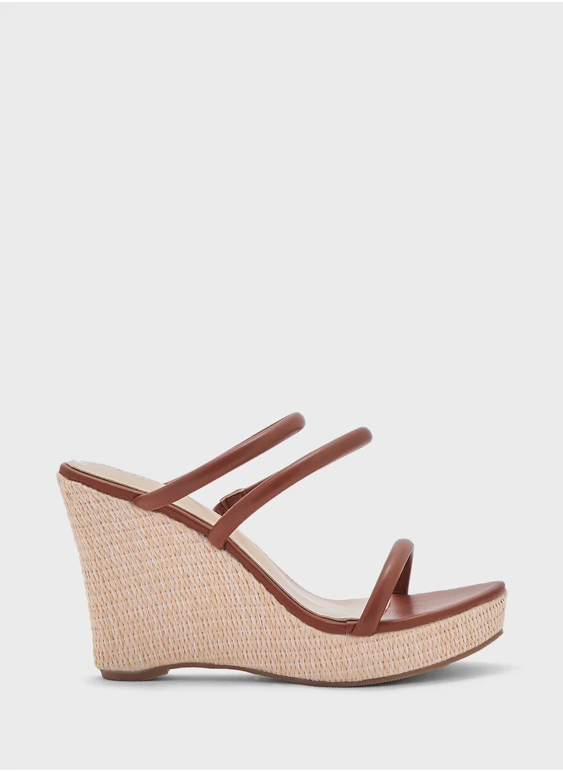 ايلا Ankle Strap Wedge Sandal