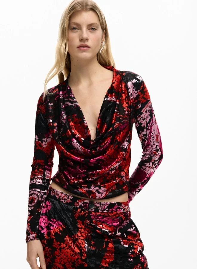 ديسيجوال قميص صممه السيد كريستيان لاكروا