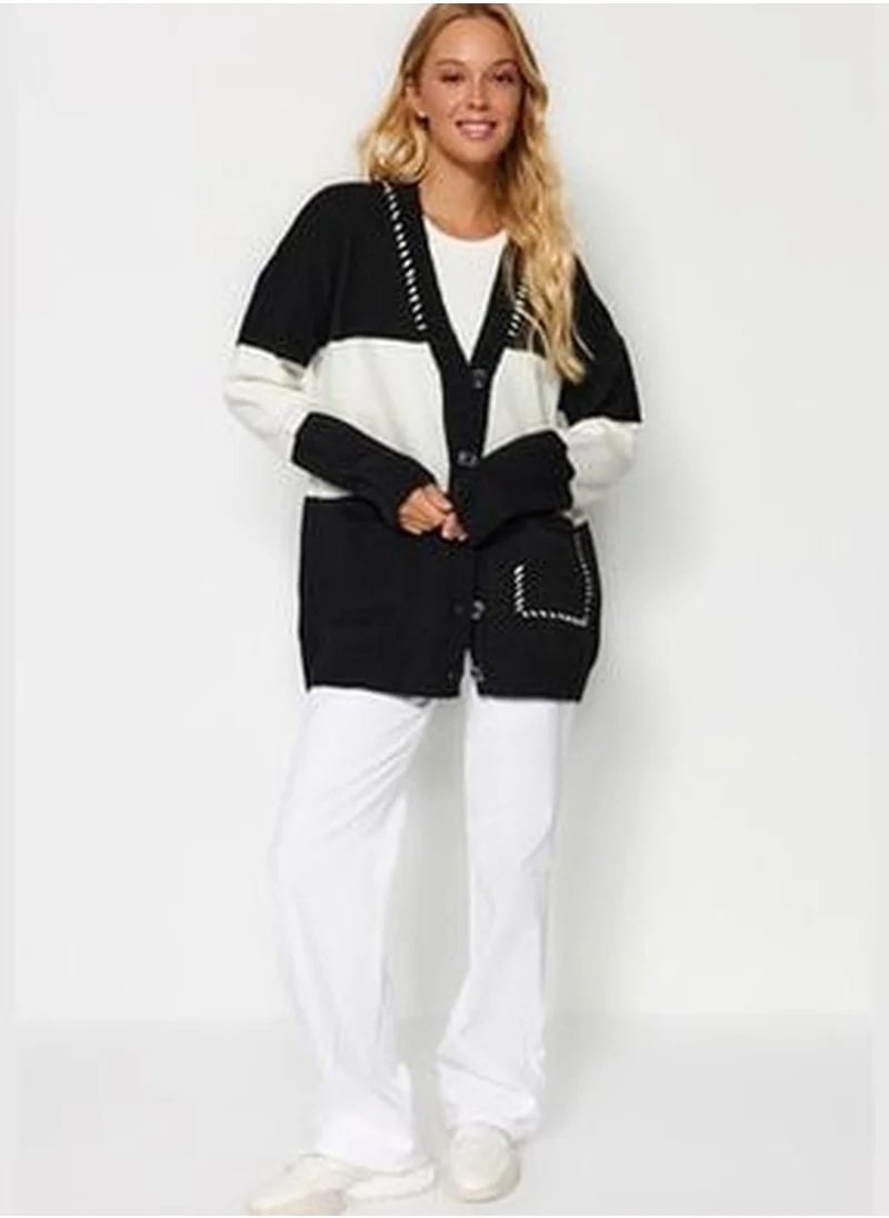 trendyol Black Super Wide Fit Soft Textured Knitwear Cardigan TWOAW24HI00348.